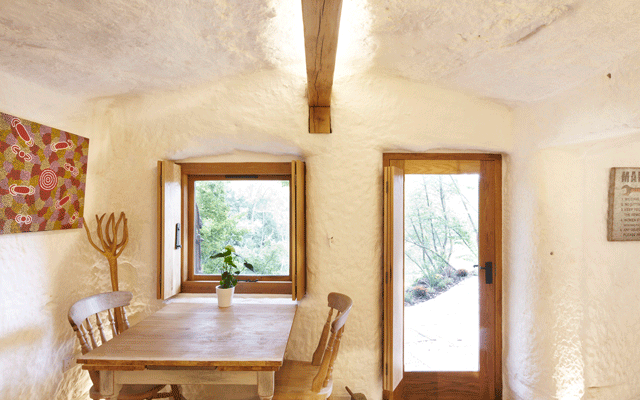 The dining area looks out over the outdoor terrace