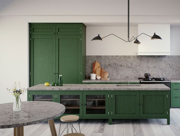 Green kitchen with granite worktops