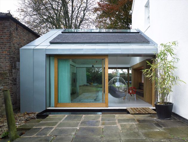 Courtyard style pool house and studio extension 4