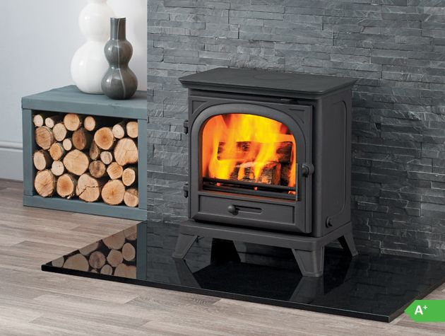 Black eco-friendly stove in living room -capital-fireplaces-granddesignsmagazine.com