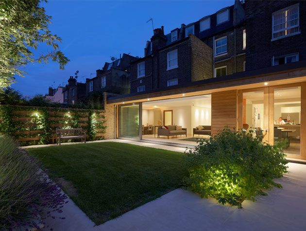 House with outdoor lighting in back garden -john-cullen-lighting-home-improvements-granddesignsmagazine.com