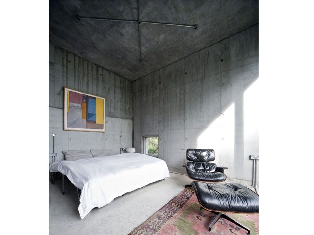 Bedroom with concrete walls and floor in concrete house featured on the sixth episode of the 2018 series of Grand Designs -tv-houses-granddesignsmagazine.com