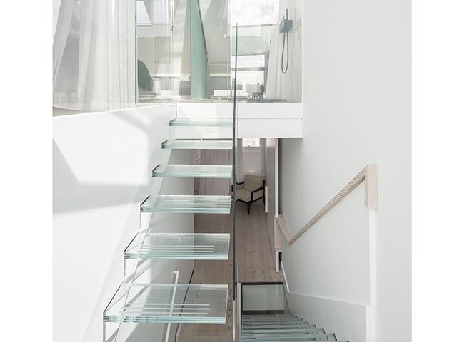 Indoor glass staircase leading into loft conversion - your architects - conversions - granddesignsmagazine.com