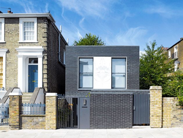 exterior of an urban infill house in one of London's terraced streets