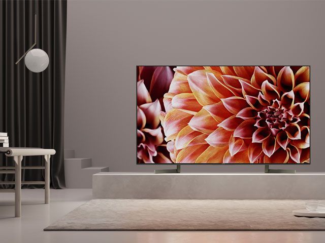 Sony Bravia 4k Ultra HD XF90TV with lotus flower on the screen placed in a living room -sony-home-improvements-granddesignsmagazine.com