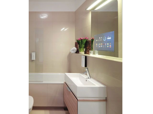 A bathroom with a mirrored Smart TV -pilkington-mirroview-home-improvements-granddesignsmagazine.com