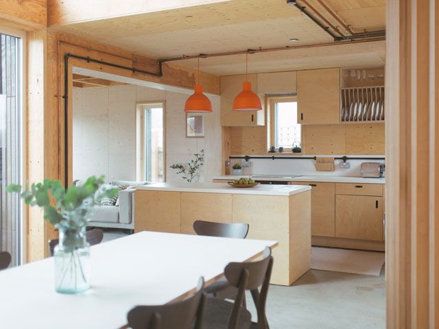 The bright kitchen diner of the u-build box house featured on Channel 4's My Grand Design, designed by studio bark