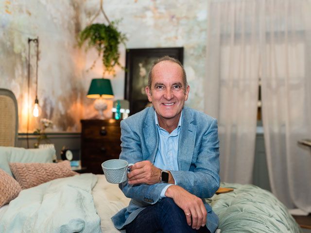 Kevin McCloud, host of Grand Designs TV show at the roomsets at Grand Designs Live at NEC Birmingham