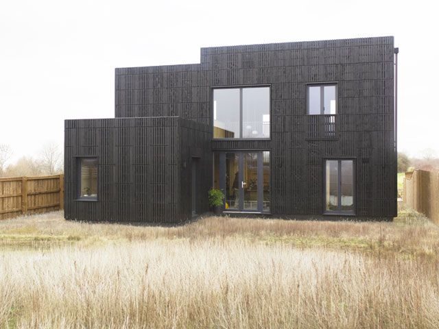 the exterior of box house by studio bark as part of a custom build homes t Graven Hill as featured in Grand Designs The Street 2019
