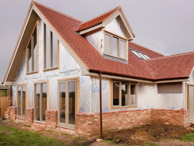 A timber frame home nearing completion