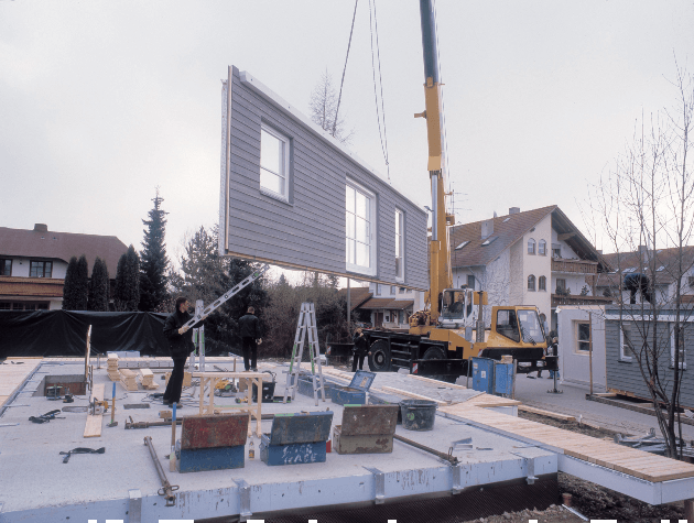 A timber frame house under construction