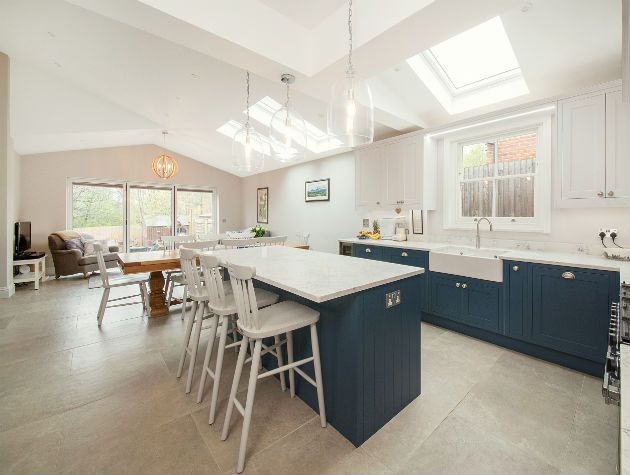 a kitchen and dining room with island and sash windows copy