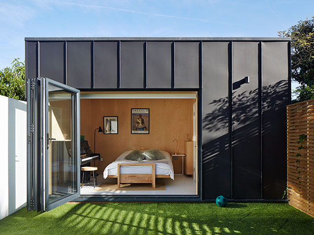 A garden room that transforms into a guest bedroom in north London by Mulroy Architects 