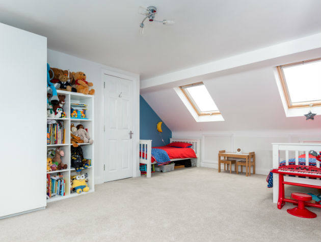 converted loft with childrens beds and toys