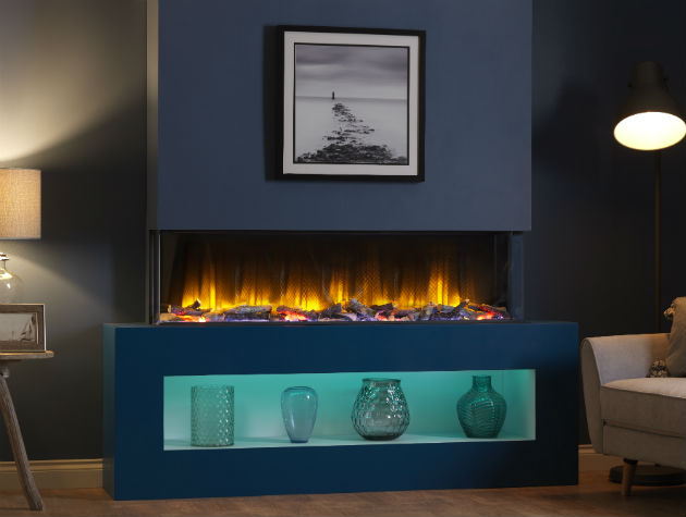 modern fireplace with electric wood effect fire vases and blue led lighting