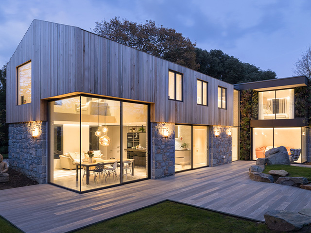 stone house modern exterior - 7 striking stone houses - self build homes - granddesignsmagazine.com