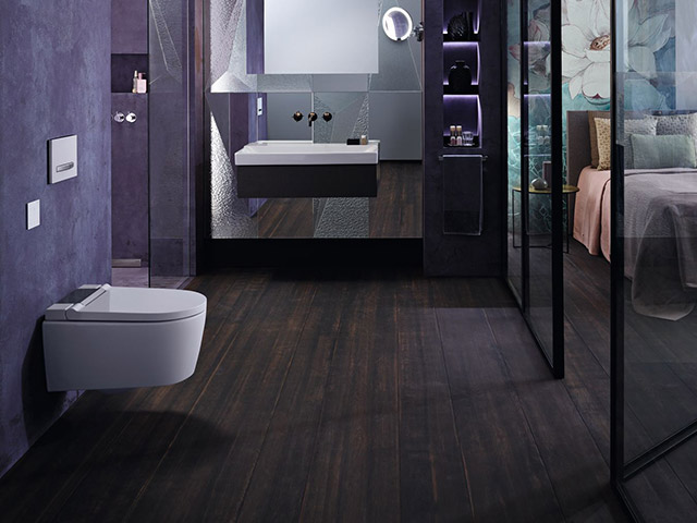 Geberit AquaClean Sela gloss chrome plated toilet in master suite bathroom - grand designs 