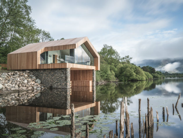 contemporary boathouse next to river