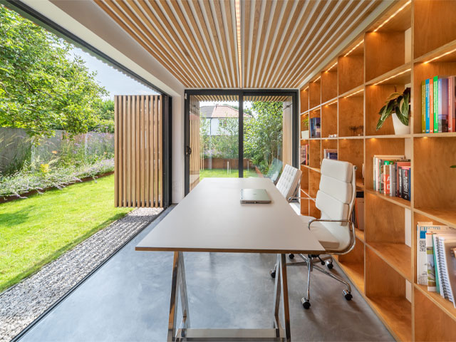 A garage converted into a home office by NCA Architecture