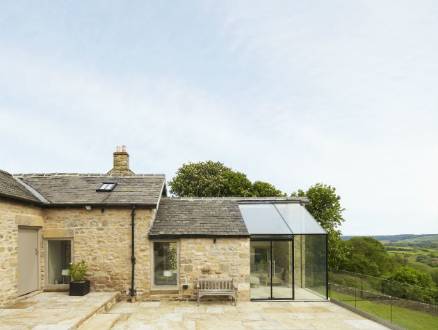 single level home with glass extension
