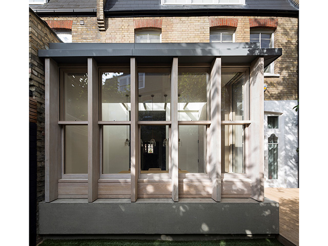 modern wooden extensive to an edwardian house by Studio Carver Richard Chivers - grand designs