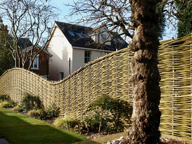 wicker garden fence - buyer's guide to garden walls and fences - home improvements - granddesignsmagazine.com