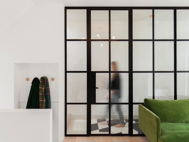 glass partition between hall and living room