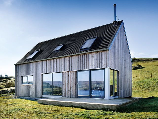 Larch wood cladding on an R2F house on the Isle of Skye