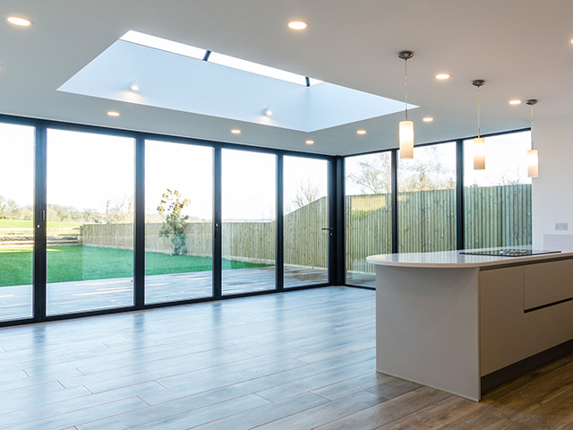 modern kitchen with fixed glazing and roof lights - grand designs - self build 