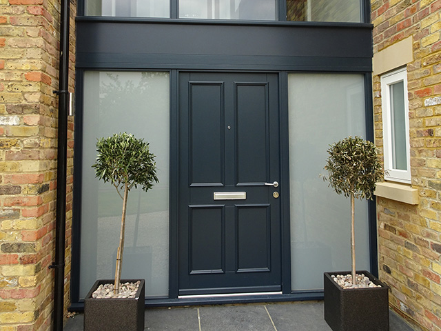 Classic style timber front door with four panels - grand designs - self build