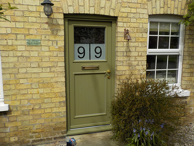 Traditional front door with window glass and lettering - self build - grand designs
