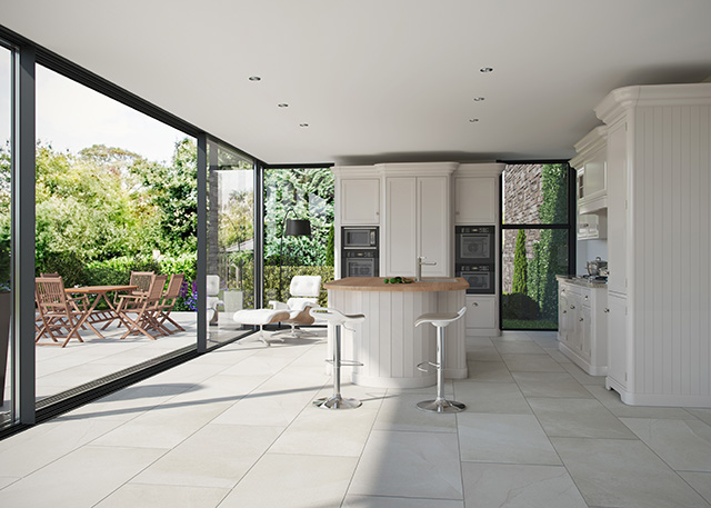 white kitchen with tiles and island
