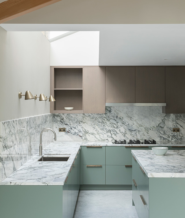 modern kitchen with green and brown cabinets and marble surfaces - extension - grand designs