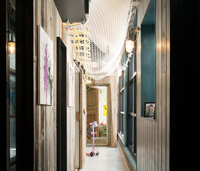 hallway with children's netting above - grand designs