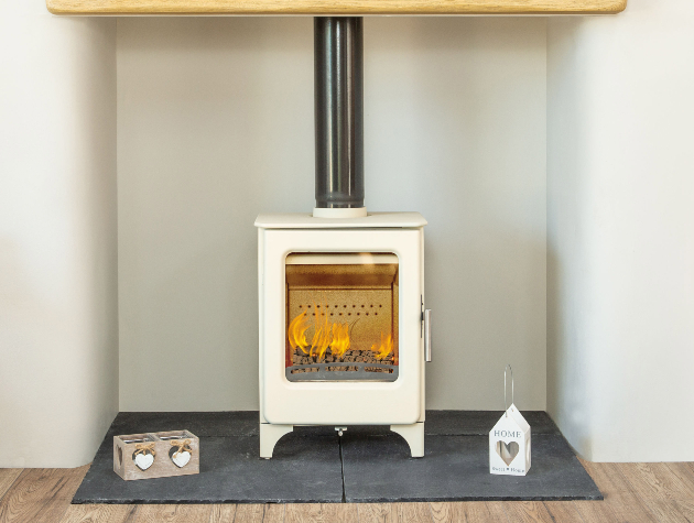 ivory coloured stove in fireplace with mantel and hearth
