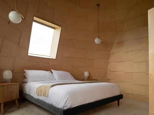 interior bedroom with timber shingles of self build oast house - grand designs - self build homes