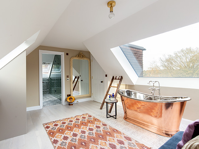 copper bathtub in loft conversion bedroom - grand designs