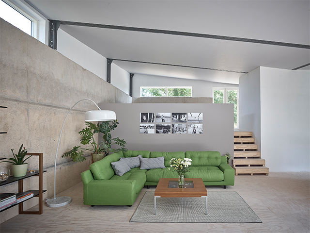 green sofa living room modern self build - reduce the carbon footprint of your build - self build homes - granddesignsmagazine.com
