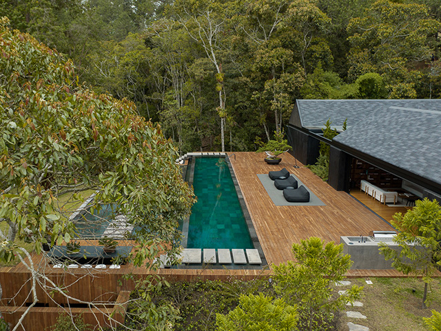 japanese refuge self build with outdoor reflecting swimming pool - grand designs
