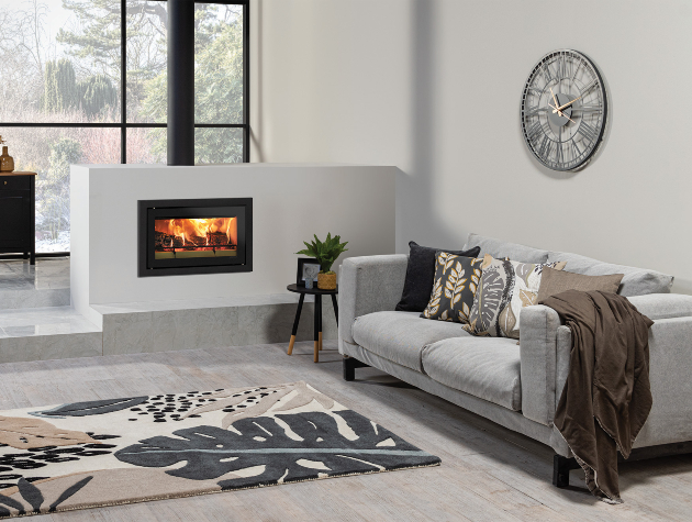 stylish lounge with sofa rug fire and metal framed windows copy