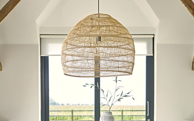 Oversized wicker pendant lamp