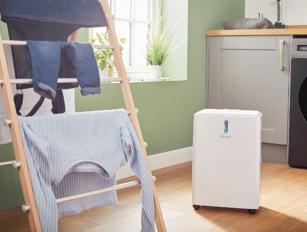 Dehumidifier with laundry in foreground