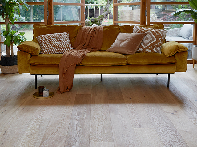 Living room showing pale oak wood flooring with attractive grain patterns