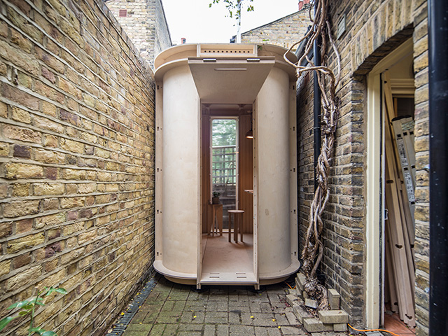 Prefabricated garden office fitted into a small side return space.