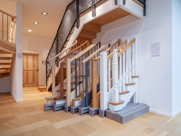 variety of stair cases on display in a showroom