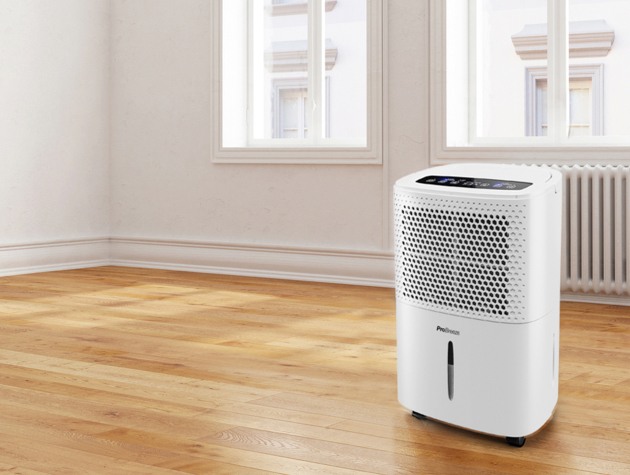 white probreeze dehumidifier in empty room