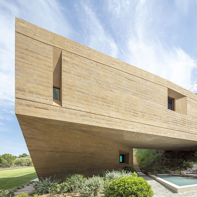 View of the private courtyard at Villa Varoise in France, which is one of the best self build homes in 2020