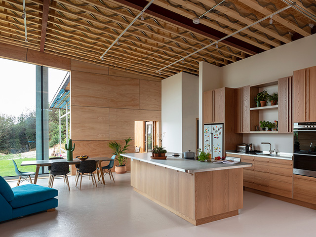 View of the oak veneered plywood cabinets with inset handles