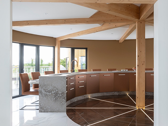 Looking through the doorway into the semi-circular kitchen - Grand Designs kitchens