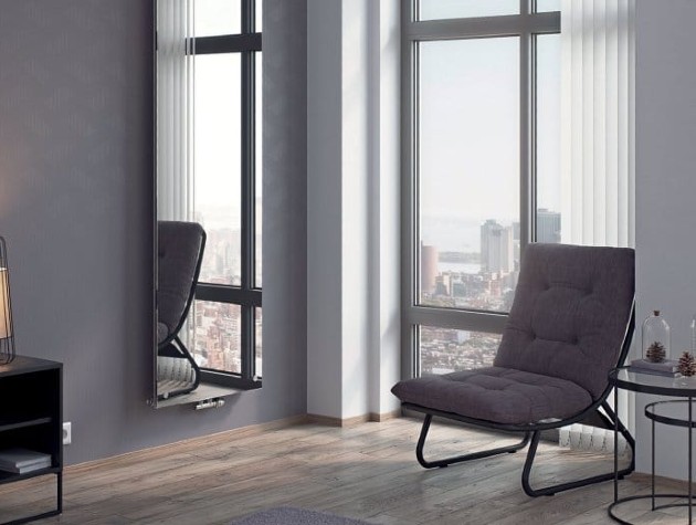 room with wooden floor mirror grey chair and city view